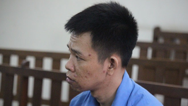 Bị chém và ‘tắm’ nước sôi vì mời bia mà không uống Trần Thiện Đức tại tòa ngày 6/6. Ảnh: Tân Châu