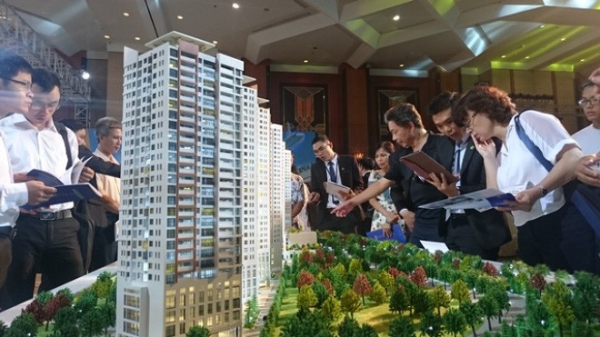 Tiền đang đổ vào bất động sản? Chuyên gia nhận định rủi ro liên quan đến tín dụng bất động sản không phải không có nhưng không còn cao như trước. Ảnh minh họa