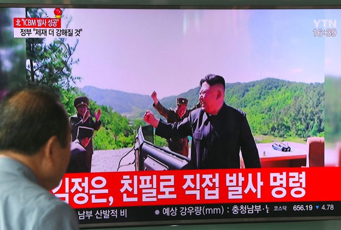 Ông Kim Jong-un tuyên bố hoàn tất chương trình hạt nhân Ảnh: Guardian