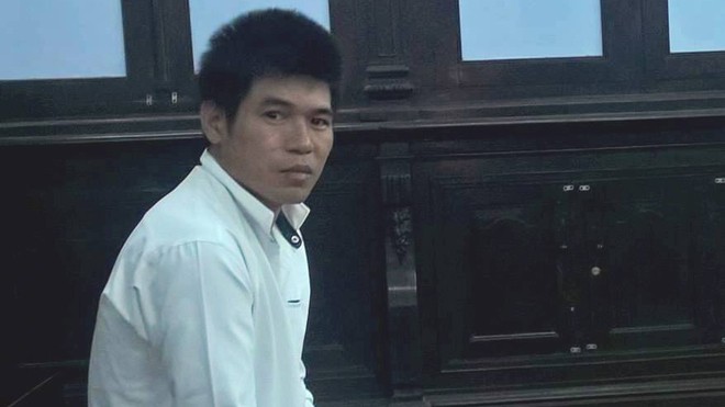 Lĩnh án 13 năm tù vì giao cấu với người yêu 'nhí' Huỳnh Văn Thọ tại tòa sáng 29/11. Ảnh: Tân Châu