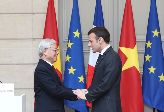 Tổng Bí thư kết thúc thăm chính thức Pháp, đi thăm cấp Nhà nước Cuba Tổng Bí thư Nguyễn Phú Trọng và Tổng thống Cộng hòa Pháp Emmanuel Macron. (Ảnh: Trí Dũng/TTXVN).