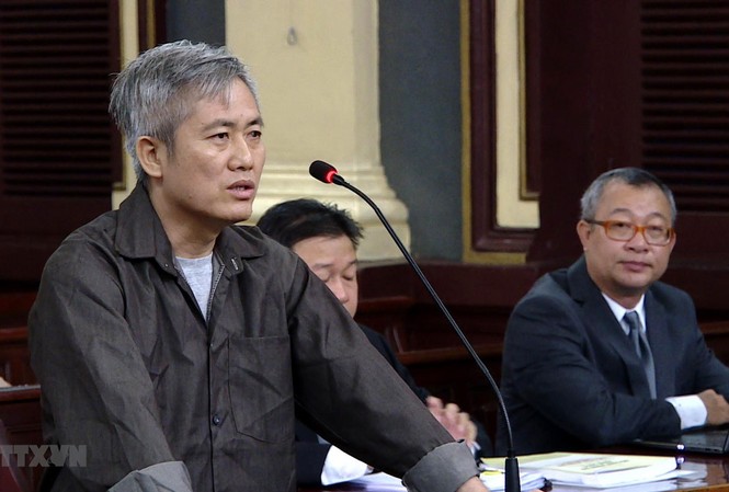 Xét xử sơ thẩm nhóm phản động 'Liên minh dân tộc Việt Nam' Trong ảnh: Bị cáo Lưu Văn Vịnh, kẻ chủ mưu thành lập tổ chức “Liên minh dân tộc Việt Nam,” tại phiên tòa. (Ảnh: Thành Chung/TTXVN)