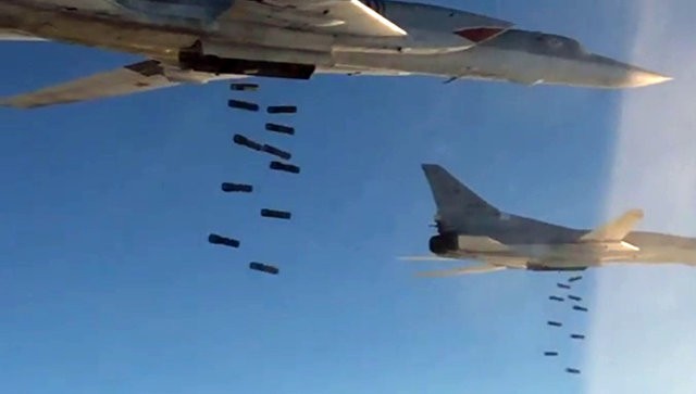 Siêu máy bay ném bom Tu-22M3 đồng loạt tấn công IS ở Syria Ảnh: Bộ Quốc phòng Nga.