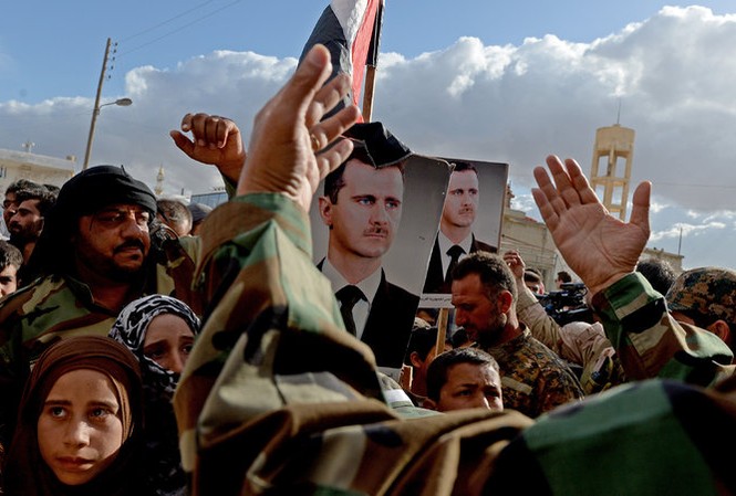 Chiến sự tại Syria buộc Mỹ phải lắng nghe Nga Vị trí của Tổng thống Bashar al-Assad được củng cố nhờ chiến dịch quân sự của Nga ở Syria. Ảnh: AFP