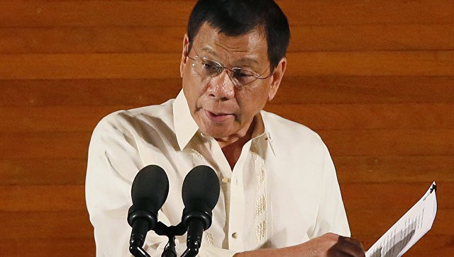 Tổng thống Philippines hối tiếc sau phát ngôn về ông Obama Tổng thống Philippines hối tiếc sau phát ngôn về ông Obama. Ảnh: AP