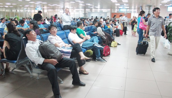 Công bố nhiều tình tiết mới vụ mất điện hàng không hy hữu Sự cố mất điện làm nhiều chuyến bay bị đình hoãn. Ảnh: Bảo An.