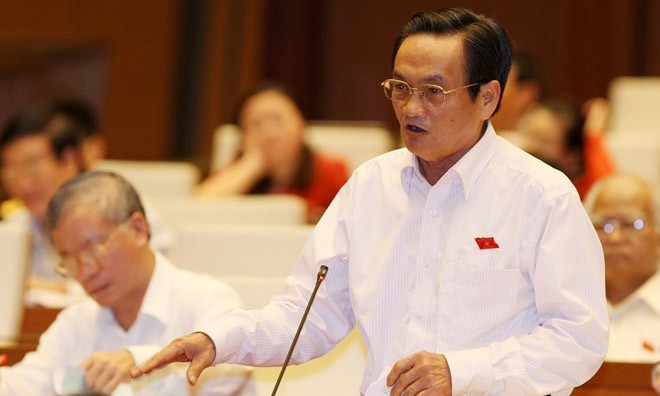 Quản lý thị trường: Dọc không ra dọc, ngang không ra ngang! Đại biểu Trần Du Lịch. Ảnh: TTXVN