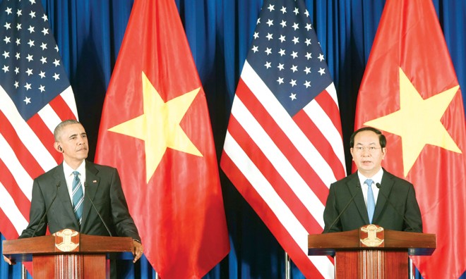 Quan hệ Việt - Mỹ đã hết rào cản Chủ tịch nước Trần Đại Quang và Tổng thống Obama tại cuộc họp báo. Ảnh: TTXVN.