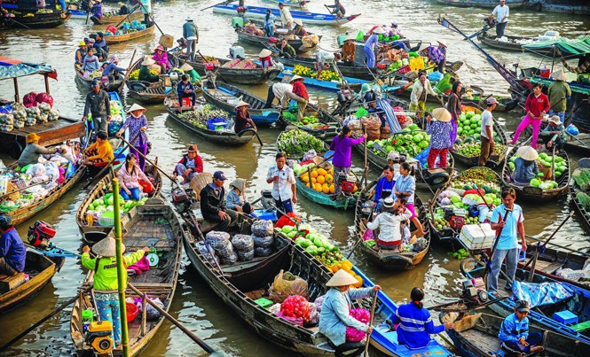 Chợ nổi Cái Răng đang “chìm”? Một cảnh mua bán ở chợ nổi Cái Răng - TP Cần Thơ. Ảnh: Nhật Anh.