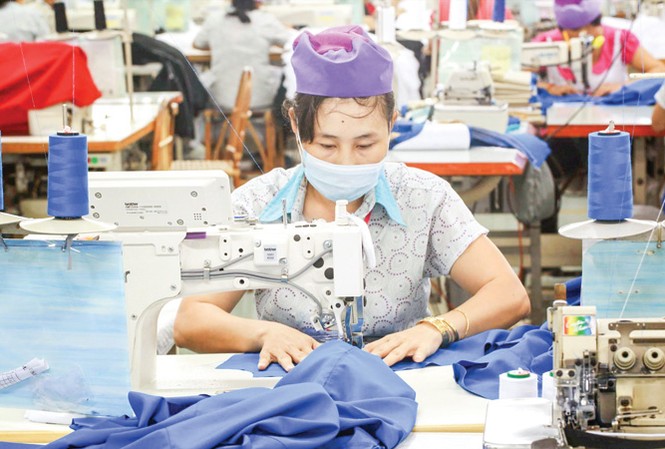 Dự thảo Luật Lao động: Tăng tuổi nghỉ hưu, giờ làm thêm Nếu Dự thảo Bộ luật Lao động sửa đổi được Quốc hội thông qua, sẽ có nhiều thay đổi lớn trên thị trường lao động. Ảnh: ILO.