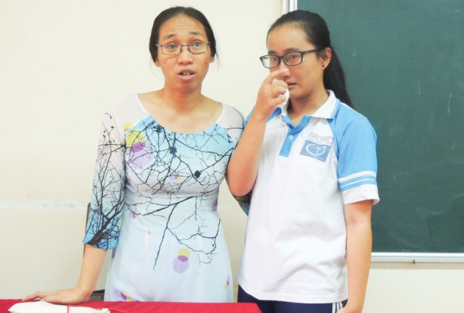SOS - Bạo hành không đánh đập Cô giáo Trần Thị Minh Châu và học sinh Phạm Song Toàn. Ảnh: Internet.