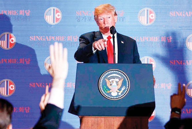 Nước Mỹ lục đục sau cam kết của ông Trump Ông Trump tuyên bố sẽ chấm dứt tập trận trên bán đảo Triều Tiên. Ảnh: CNN.