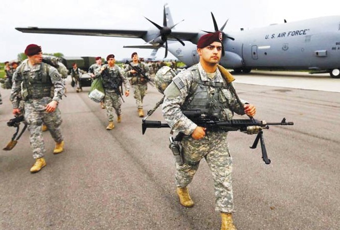 NATO ‘bằng mặt không bằng lòng’ về tiền bạc Mỹ nói họ phải chi tiền bảo vệ các đồng minh châu Âu trong khi thiệt thòi về thương mại. Ảnh: Strategic-culture.org.
