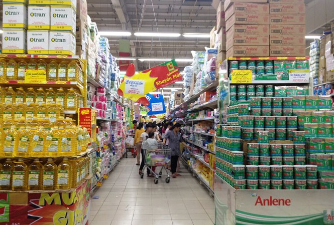 Ðằng sau việc đại gia Thái Lan thâu tóm doanh nghiệp Việt Các chuyên gia cho rằng, các DN sẽ gặp khó khăn khi hệ thống phân phối nằm trong tay các DN ngoại. Ảnh: Ngọc Châu.