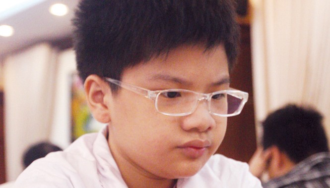 Vàng mười của thể thao Việt Nam Kỳ thủ nhí Nguyễn Anh Khôi trở thành kỳ thủ Việt Nam đầu tiên đăng quang ở cả giải U10 và U12 thế giới. Ảnh: VSI