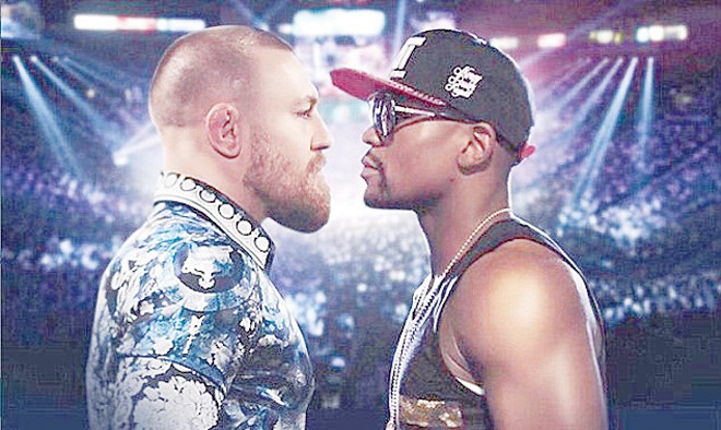 100 triệu USD để Floyd Mayweather trở lại võ đài Poster cuộc đối đầu giữa “gã điên” và “độc cô cầu bại” được McGregor “chế” và đăng lên trang twitter của mình.
