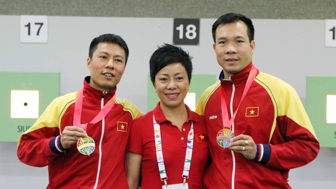 Phía sau HCV Olympic 2016: Người đàn bà thép Nguyễn Thị Nhung HLV Nguyễn Thị Nhung và các học trò.