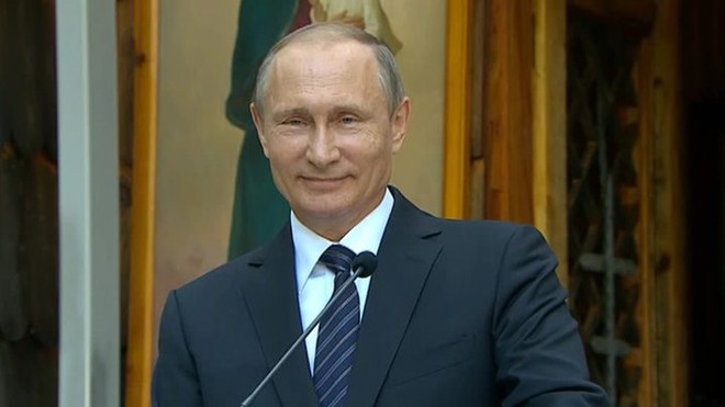 Báo Anh giải mã nụ cười bí ẩn của ông Putin Báo Anh giải mã nụ cười bí ẩn của ông Putin