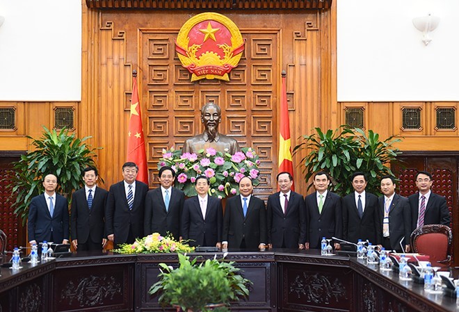 Thủ tướng Nguyễn Xuân Phúc tiếp Bộ trưởng Công an Trung Quốc Thủ tướng Nguyễn Xuân Phúc chụp ảnh lưu niệm với Bộ trưởng Công an Trung Quốc Quách Thanh Côn. Ảnh: VGP.
