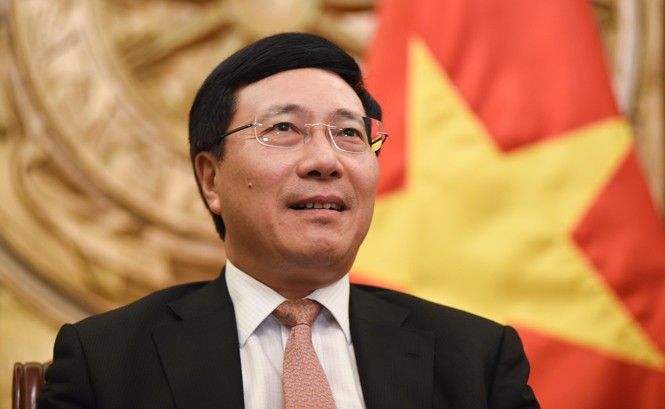 Tiết lộ đàm phán căng thẳng suýt thất bại ở APEC Phó Thủ tướng, Bộ trưởng Ngoại giao Phạm Bình Minh. Ảnh: Thu Loan.