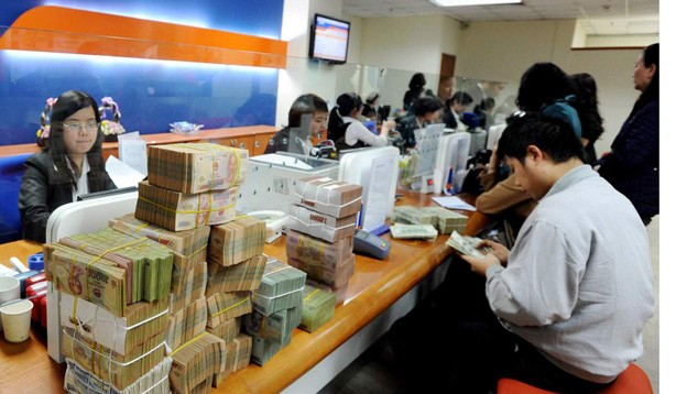 WB đánh giá về kinh tế việt nam 2018: Nợ xấu còn lớn, rủi ro còn nhiều Theo WB, giải quyết nợ xấu ngân hàng vẫn là nhiệm vụ cần được ưu tiên trong thời gian tới. Ảnh: Hồng Vĩnh.