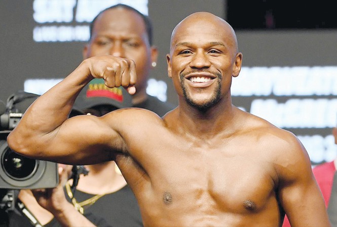 Mayweather tái xuất vì tiền? Mayweather xác nhận thi đấu trong lồng bát giác. Ảnh: GETTYIMAGES.