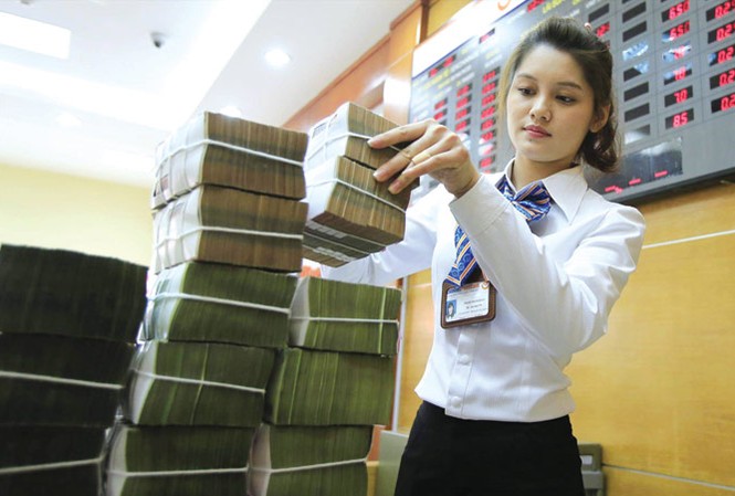 Giải ngân vốn đầu tư công chậm: Do sợ trách nhiệm? Giải ngân vốn đầu tư công chậm, trong khi nhiều dự án vẫn được duyệt với mức vốn ít sau đó cấp bù, tăng vốn. Ảnh minh họa: Như Ý.