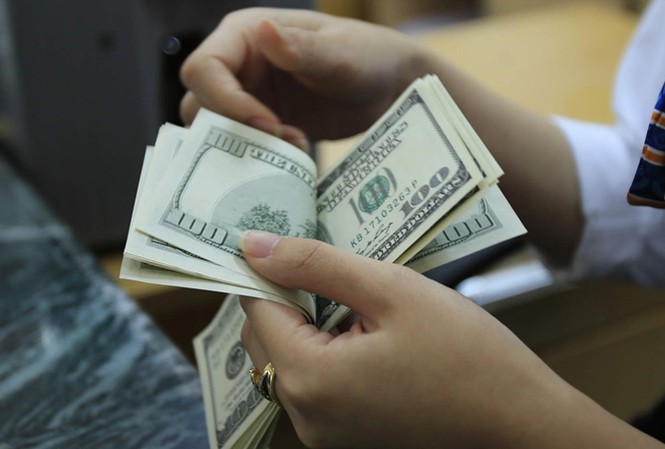 Nếu cần, sẽ bán ngoại tệ can thiệp NHNN sẵn sàng bán ra USD để can thiệp thị trường.