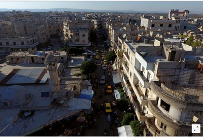 Trung Ðông nóng với những lời tuyên bố Một góc thành phố Idlib (Reuters)