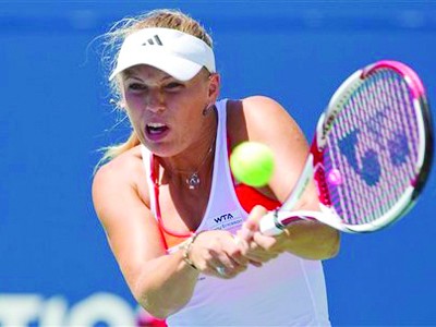 Tới lượt Nadal, Wozniacki chia tay trận đầu Tới lượt Nadal, Wozniacki chia tay trận đầu