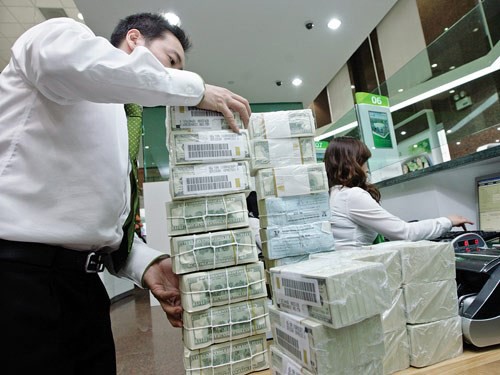 Vốn rẻ ê hề, khách vay hờ hững Các ngân hàng gặp khó khăn khi giải ngân.