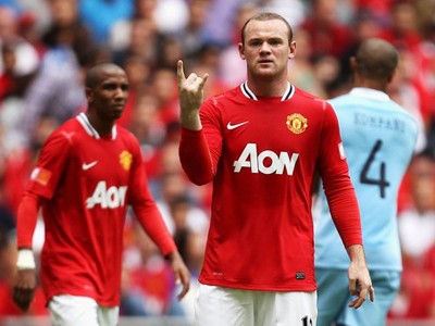 Rooney cười nhạo Man City Rooney cười nhạo Man City