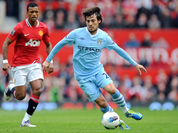 Thành Manchester đua đầu bảng Manchester United (đỏ) luôn sẵn sàng vượt qua Manchester City nếu thời cơ tới.
Ảnh: Getty Images