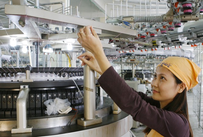 Nguy cơ vỡ Quỹ bảo hiểm xã hội Lao động ngành dệt may. Ảnh: Hồng Vĩnh
