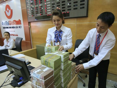 Một năm chính sách tiền tệ: Còn lắm bộn bề Một năm chính sách tiền tệ: Còn lắm bộn bề