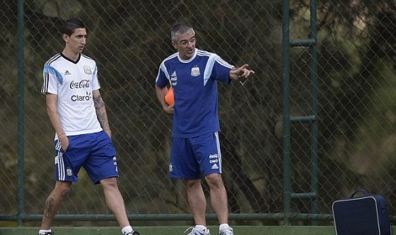 Di Maria chạy đua để trở lại chơi trận chung kết Di Maria tiếp tục các bài tập trên sân tập của Argentina ngày hôm qua - Ảnh: AFP