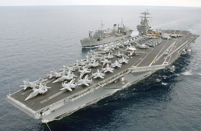 Mỹ sát cánh cùng Pháp điều tàu sân bay không kích IS Tàu sân bay USS Harry S.Truman rời cảng Norfolk sáng 16/11. Ảnh: Reuters