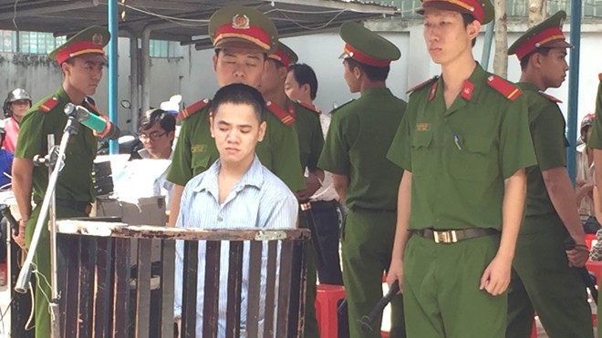 Giết hai chị em đồng nghiệp rồi tự sát vì bị phê bình Lương Văn Hải trước vành móng ngựa. Ảnh: Tân Châu