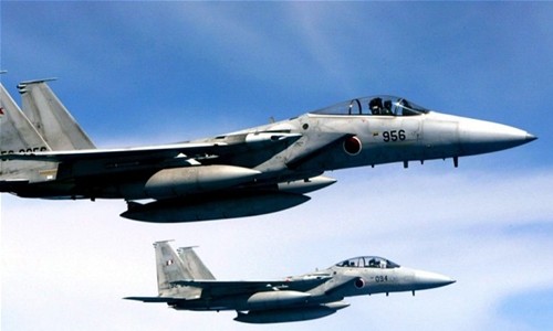 Tiêm kích F-15 Nhật đọ sức chiến đấu cơ Su-30 Trung Quốc Chiến đấu cơ F-15 của không quân Nhật. Ảnh: EPA.