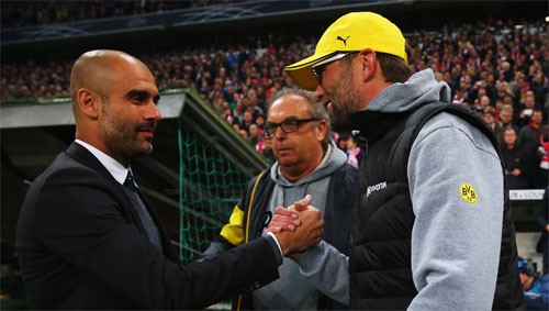 Klopp khiêu khích Guardiola vô địch Ngoại hạng Anh Pep và Klopp khi còn đối đầu tại Bundesliga. Ảnh: Reuters