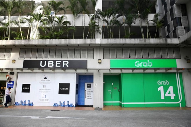 Uber Đông Nam Á sẽ công bố bán mình cho Grab hôm nay? Theo nguồn tin, Uber Đông Nam Á đã đồng ý bán mình cho Grab, thương vụ sẽ được công bố sớm nhất vào ngày 26/3. Ảnh: Today.