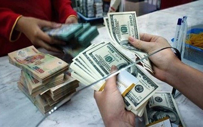 Ngân hàng đồng loạt hạ giá USD Ngân hàng đồng loạt hạ giá USD