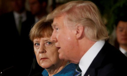 Vì sao Đức từ chối tham gia liên minh không kích Syria Thủ tướng Đức Angela Merkel (trái) và Tổng thống Mỹ Donald Trump. Ảnh: Reuters.