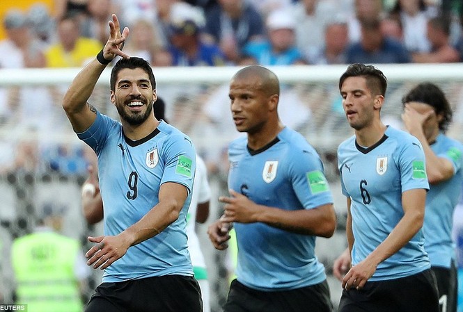 Nga và Uruguay dắt tay nhau vào vòng 1/8 World Cup Uruguay chính thức giành vé dự vòng 1/8. Ảnh: Getty.