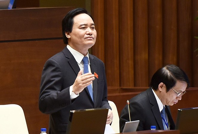 Bộ trưởng Phùng Xuân Nhạ: Đề án dạy ngoại ngữ không đạt mục tiêu Bộ trưởng Phùng Xuân Nhạ trả lời chất vấn sáng 16/11. Ảnh Như Ý