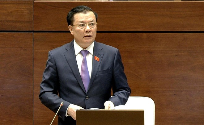 Bộ trưởng Tài chính Đinh Tiến Dũng trả lời chất vấn Quốc hội Bộ trưởng Tài chính Đinh Tiến Dũng. Ảnh: Zing