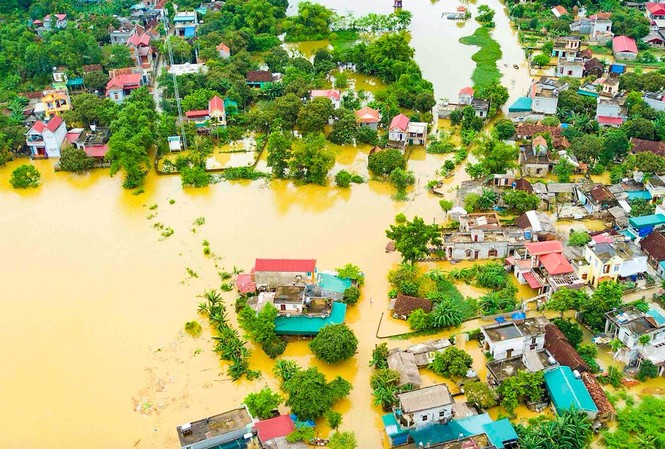 Cận cảnh mưa lũ nhấn chìm nhà dân ở Ninh Bình Cảnh ngập lụt tại Nho Quan, Ninh Bình nhìn từ trên cao. Ảnh: Minh Đức