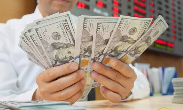 Ngân hàng Nhà nước 'siết' cho vay USD Nhiều doanh nghiệp 'thích' vay USD vì lãi suất cho vay USD thấp hơn nhiều so với lãi suất VND.(Ảnh minh họa)