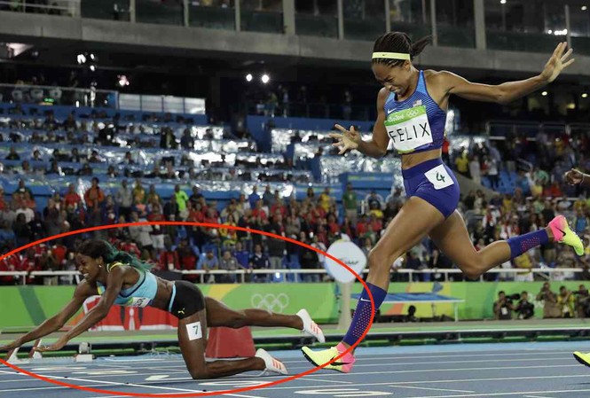 Nữ VĐV giành HCV Olympic theo cách không giống ai Nữ VĐV Shaunae Miller (khoanh đỏ) ở vạch đích.