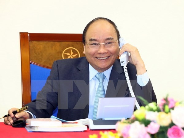 Thủ tướng Nguyễn Xuân Phúc điện đàm với Thủ tướng Nhật Bản Thủ tướng Nguyễn Xuân Phúc điện đàm với Thủ tướng Nhật Bản Shinzo Abe. (Ảnh: Thống Nhất/TTXVN)
